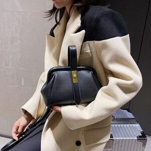 Sophisticated Black Leather Clutch / Crossbody with Sleek Frame Closure